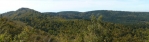 Panorama Špičáku a okolí. Nevypadá moc špičatě, ale je dost skalnatý a cesta na něj je už trochu strmá.