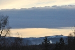 Za vrcholem Křížovky máma v dohledu zasněžený Poledník (1315 m n. m.).