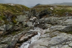 Národní park Rondane, potok poblíž jezera Rondvatnet, Norsko