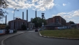 Vstup do areálu Dolní Vítkovice je zdarma. Jdeme mezi věžemi a ocelovými konstrukcemi k budově Gongu.